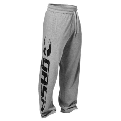 GASP Sweat Pants Greymelange, harmaameleeratut treenihousut, joissa suuri musta logo pitkin lahjetta., kuva 1/6