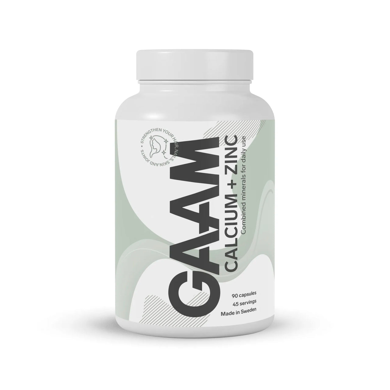 GAAM Calcium + Zinc 90 caps valkoisessa purkissa, jossa on harmaanvihreitä yksityiskohtia ja musta teksti.