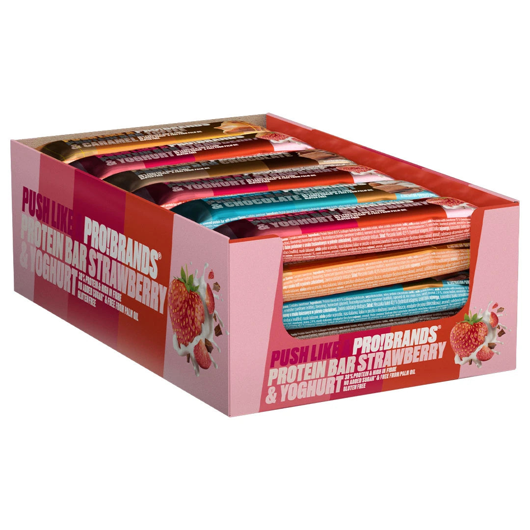 24 x Pro Brands Proteinbar 45 g Mixpack vaaleanpunaisessa laatikossa, joka on täytetty erimakuisilla proteiinipatukoilla., kuva 1/1