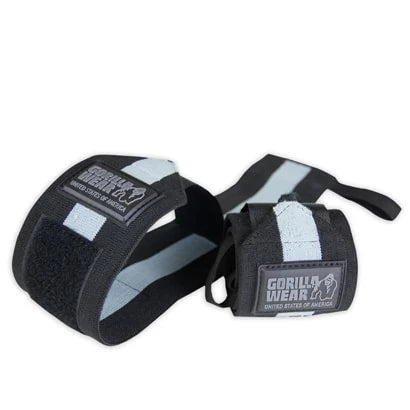 Mustat ja harmaat Gorilla Wear Wrist Wraps Ultra -rannetuet peukalolenkillä ja logolla maksimaaliseen tukeen.