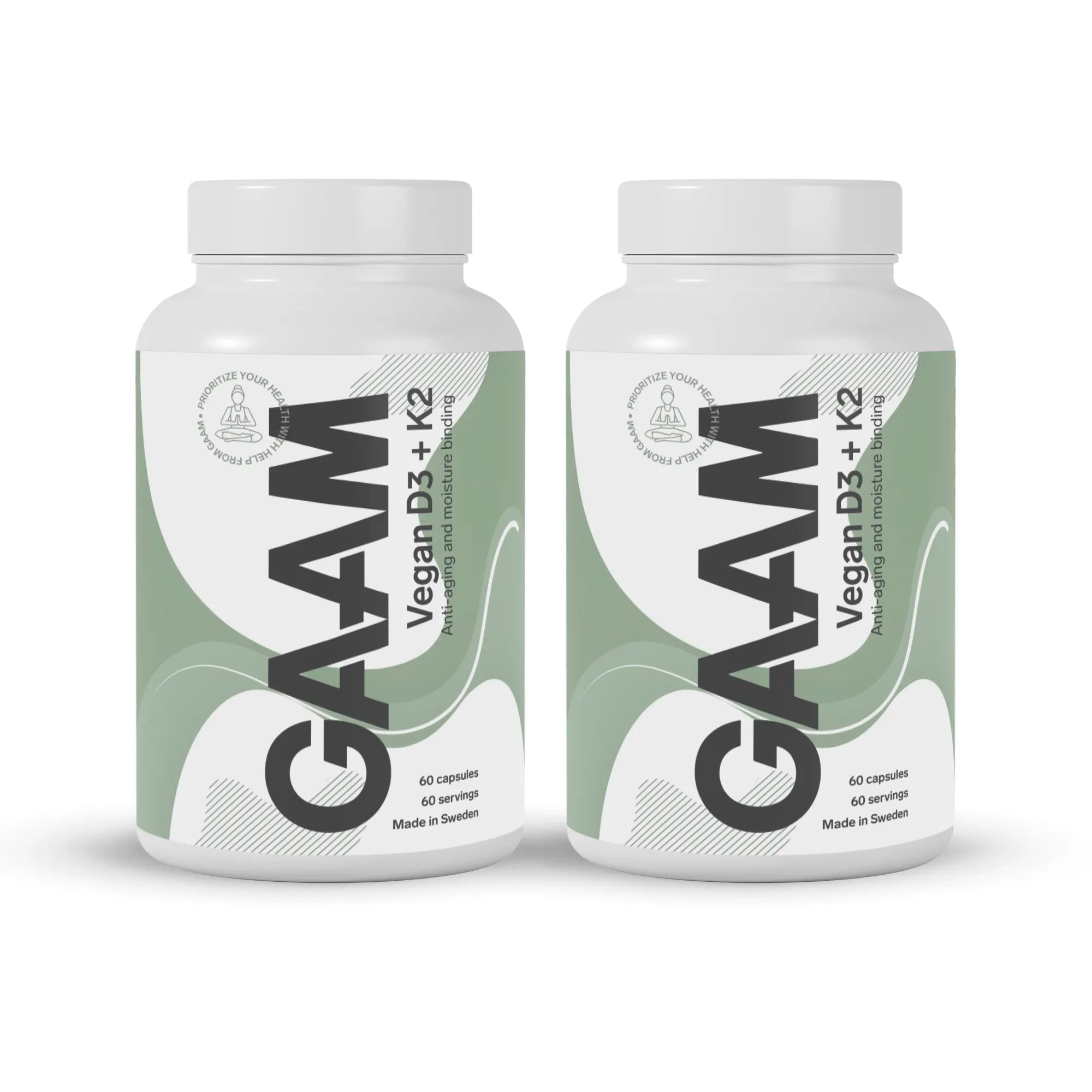 2 x GAAM Vegan D3 + K2 60 caps -ravintolisä kahdessa valkoisessa purkissa vihreillä ja harmailla yksityiskohdilla.