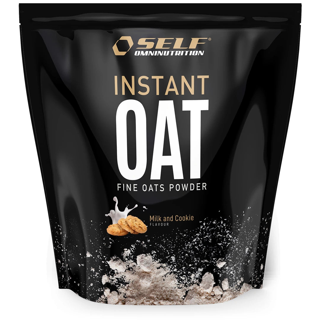 Self Omninutrition Instant Oat 1 kg -kaurajauho mustassa pussissa, jossa on keksejä ja maitoroiskeita maulle Milk &amp; Cookie., kuva 6/14
