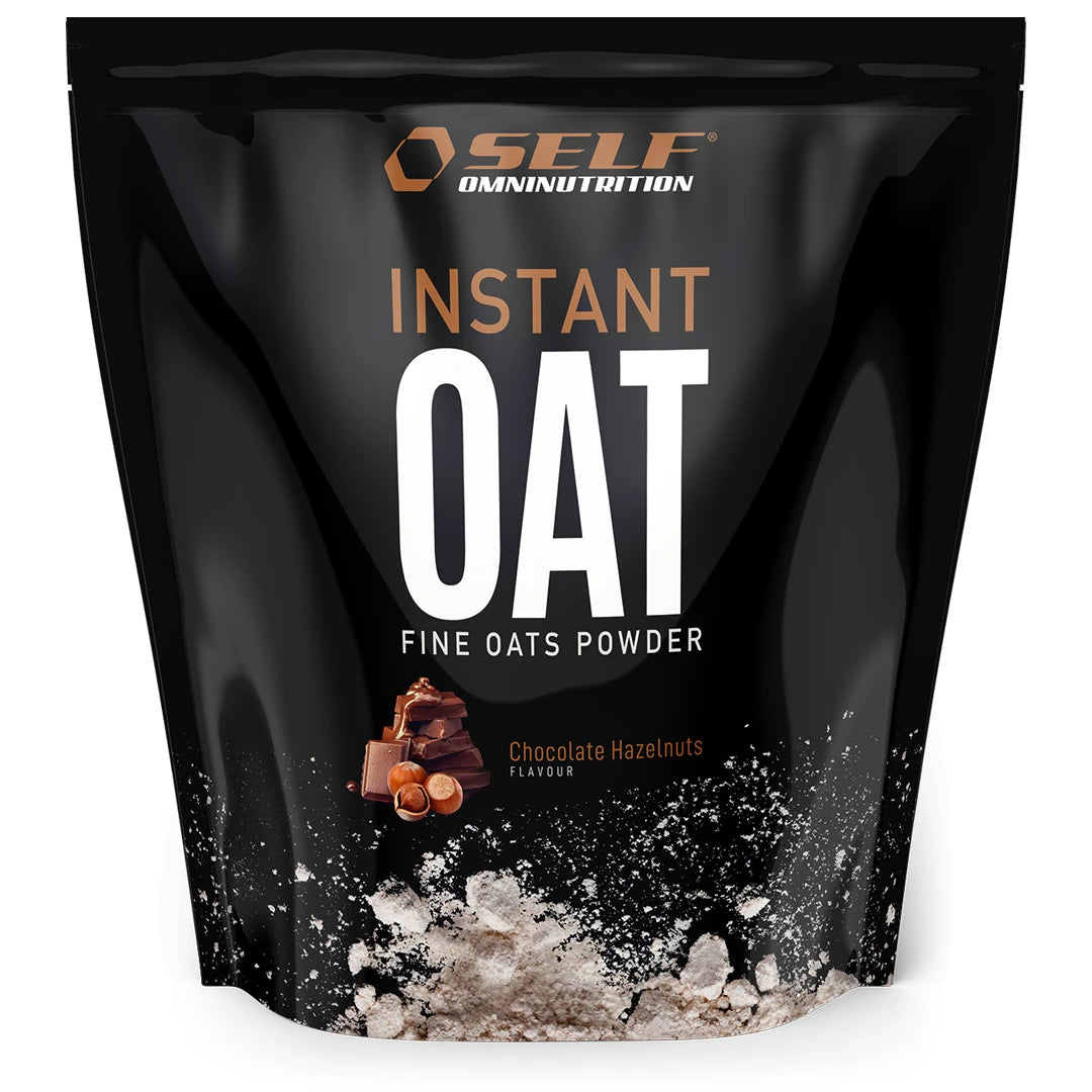 Self Omninutrition Instant Oat 1 kg -kaurajauho mustassa pussissa, jossa on suklaan ja hasselpähkinöiden kuvitus maulle Chocolate Hazelnuts., kuva 11/14