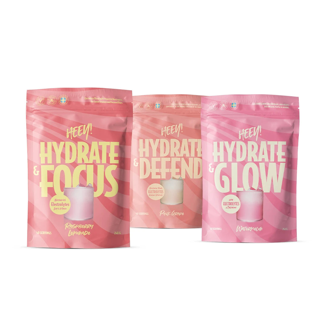 Heey! Hydration -paketti sisältää kolme vaaleanpunaista ja persikanväristä elektrolyyttijauhepussia., kuva 1/1