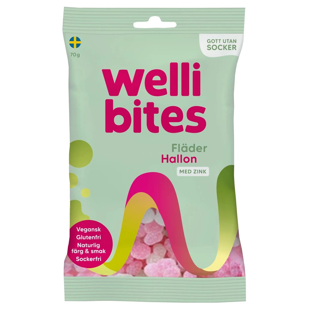 Wellibites Candy 70 g sokeriton karkki vaaleanvihreässä pussissa pinkeillä yksityiskohdilla, makuna seljanmarja-vadelma.