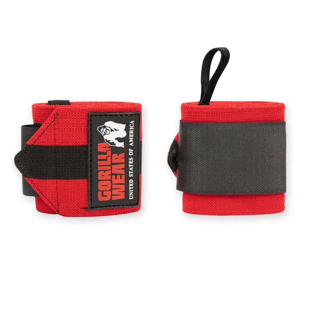 Pari punamustia elastisia Gorilla Wear Wrist Wraps Ultra Black/Red -rannetukia peukalolenkeillä.