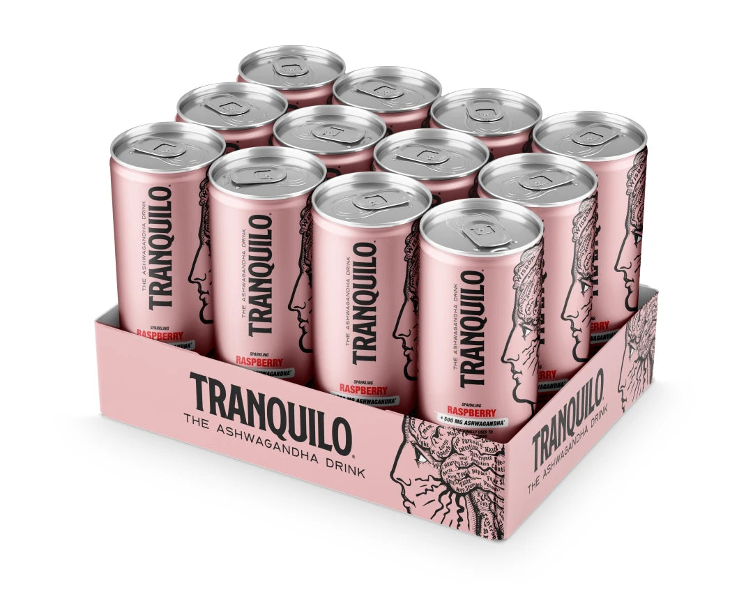 12 x Tranquilo 330 ml -juomatölkkiä vaaleanpunaisessa laatikossa mustilla yksityiskohdilla, makuna vadelma.