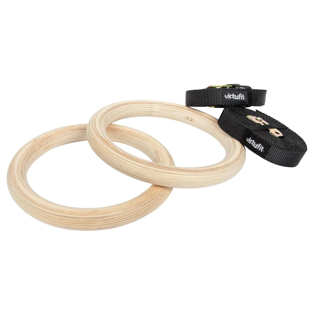 Virtufit Gymnastic Gym Rings vaaleasta puusta mustilla nailonhihnoilla joustavaan kotitreeniin.