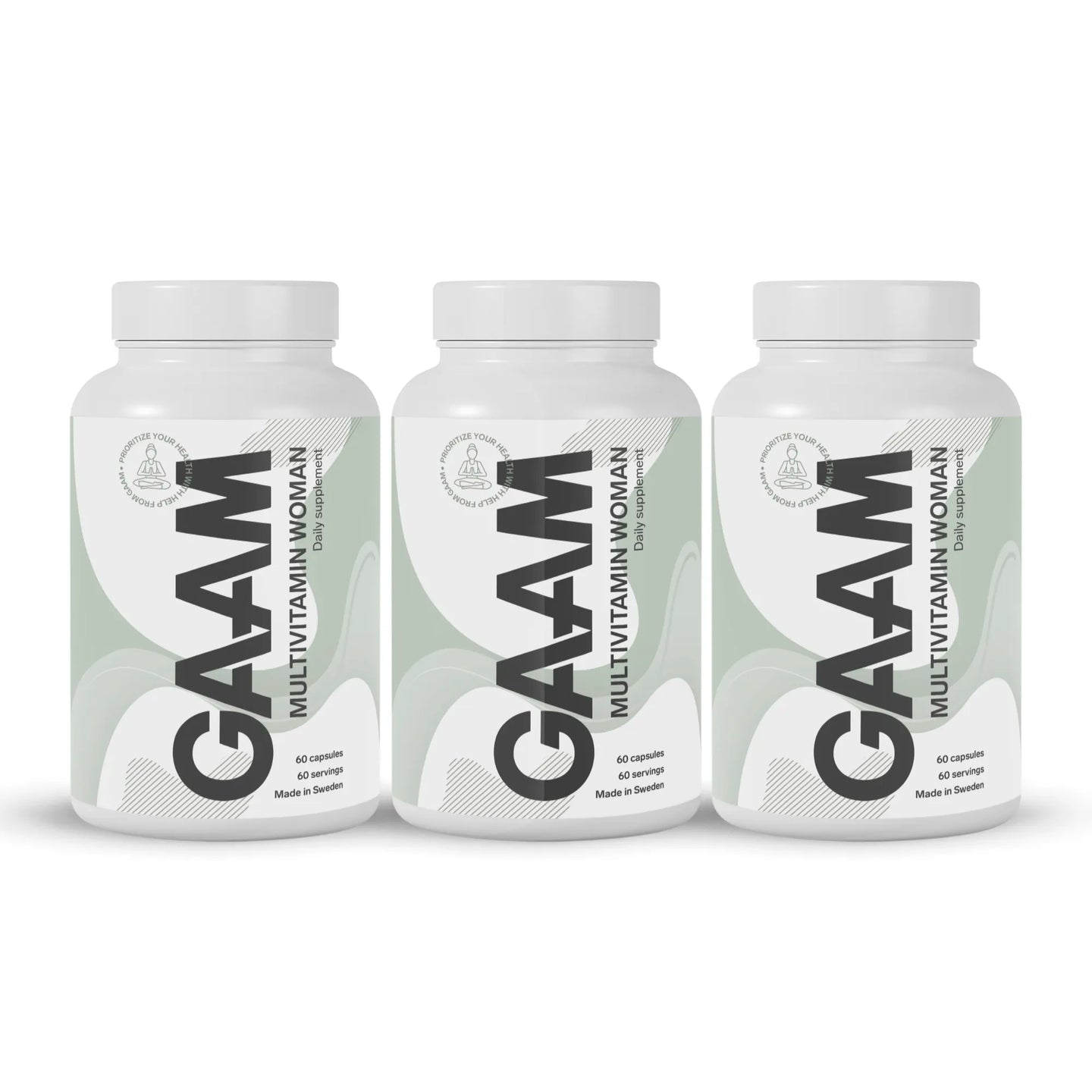 3 x GAAM Multivitamin Woman 60 caps -ravintolisä kolmessa valkoisessa purkissa vaaleanvihreillä yksityiskohdilla.