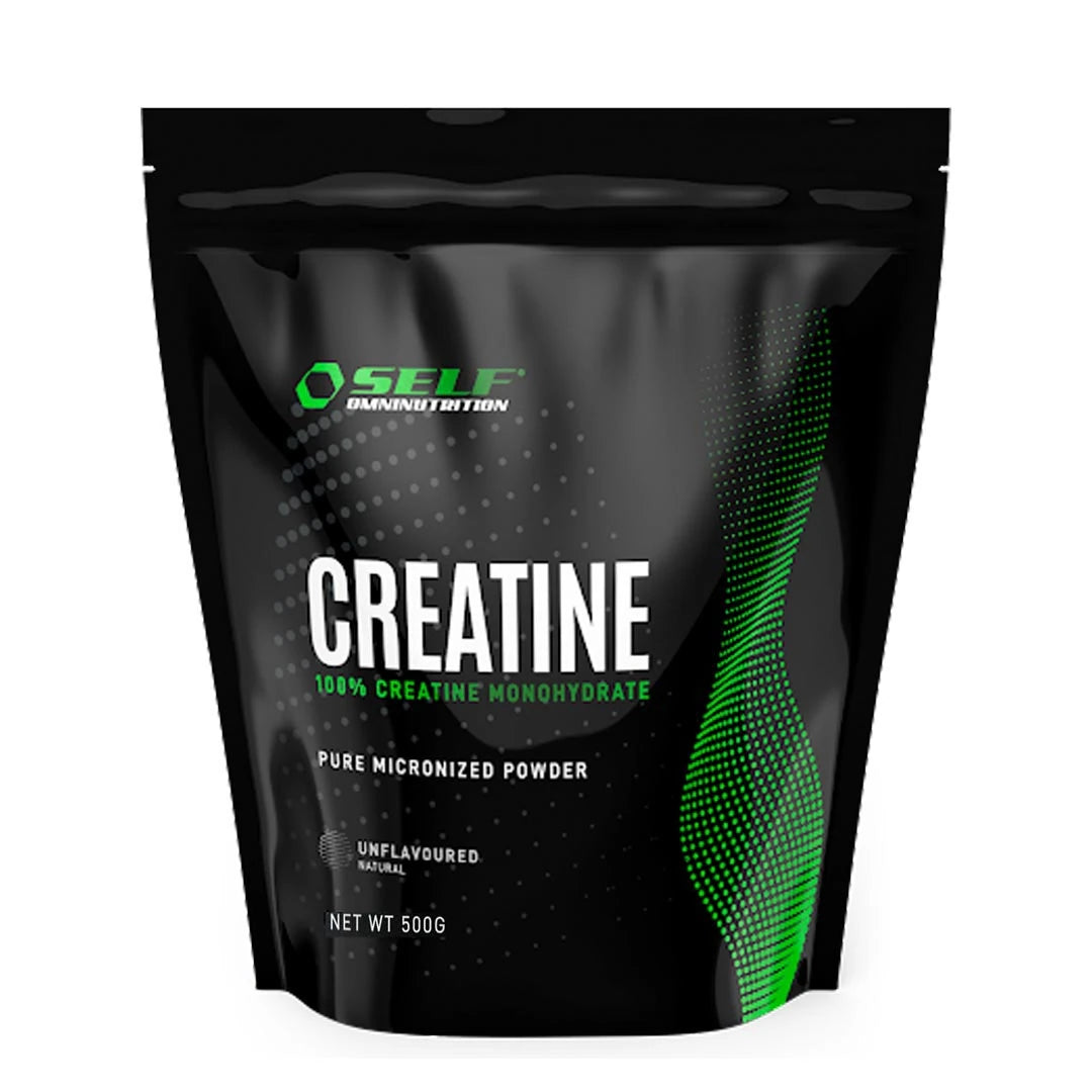 Self Omninutrition Creatine 500 g -kreatiinijauhe mustassa pussissa vihreillä yksityiskohdilla, makuna maustamaton.