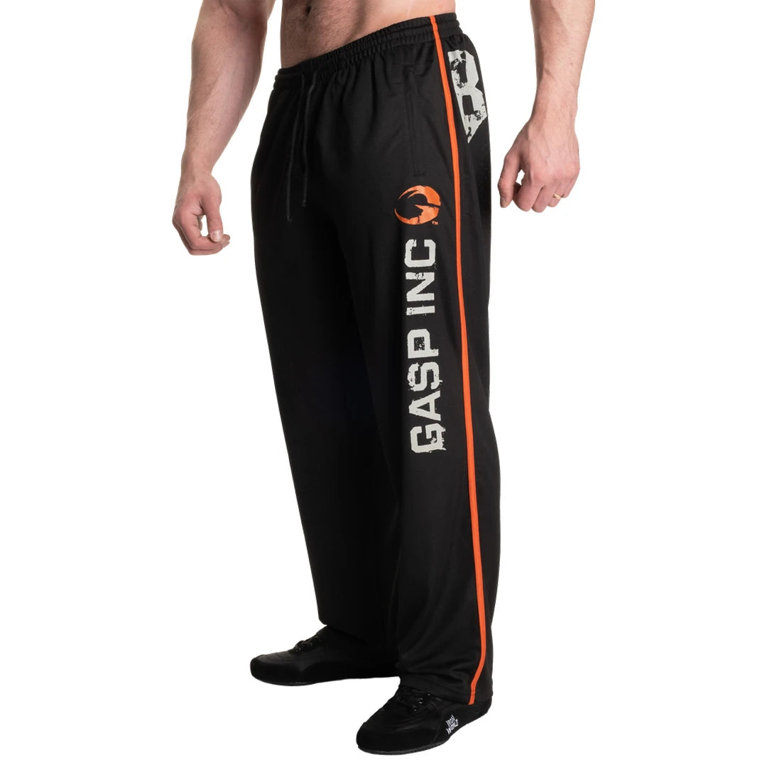 Mustat verkkokankaiset GASP No 89 Mesh Pants Black -treenihousut oranssilla raidalla ja suurella logopainatuksella., kuva 1/6