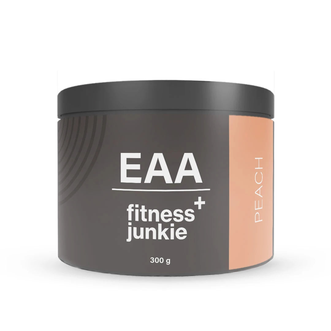 fitnessjunkie EAA 300 g -aminohappojauhe tummanharmaassa purkissa persikanvärisillä yksityiskohdilla, makuna Peach.